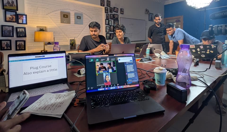 The team teaching a live class from the office